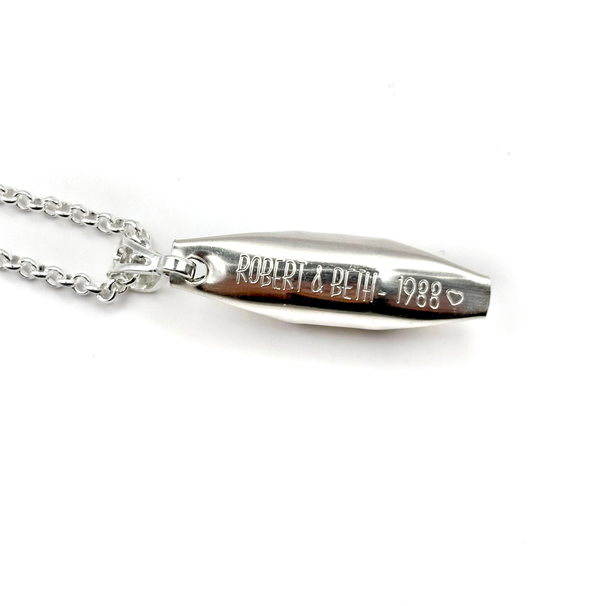 silver engraving on the back of the peas in a pod personalised