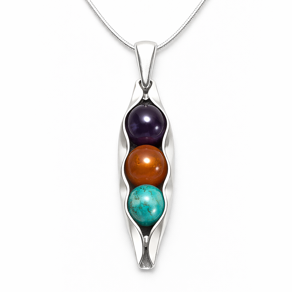 Pea pod necklace with birthstones stones on a white background 3 peas in a pod